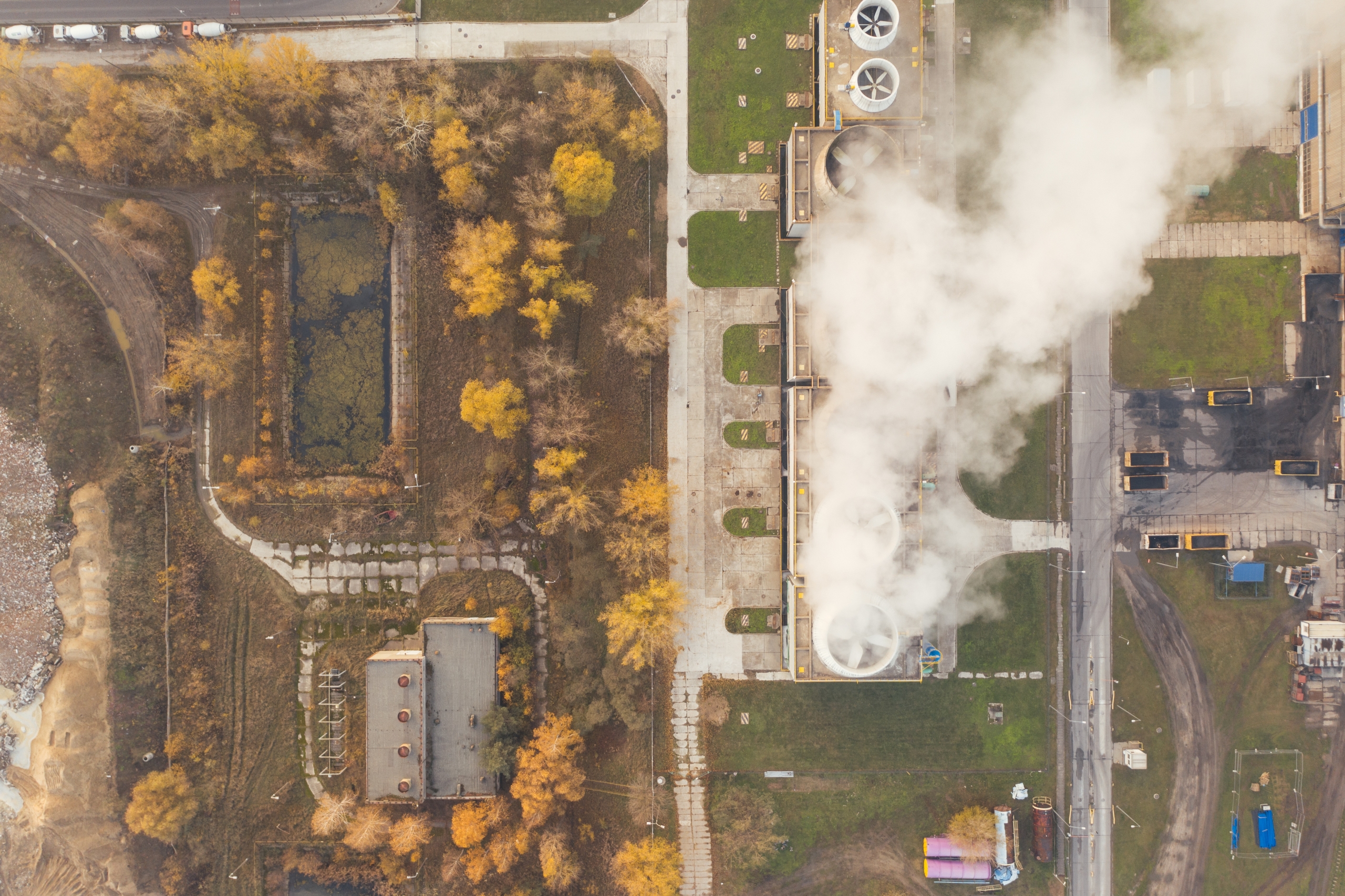 aerial view of refinery producing smoke; Will fossil fuels go away?