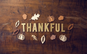 the word thankful on wooden background