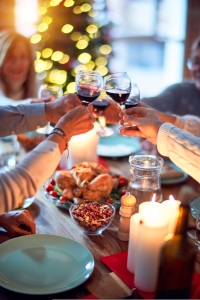 People connecting by sharing a traditional Christmas meal