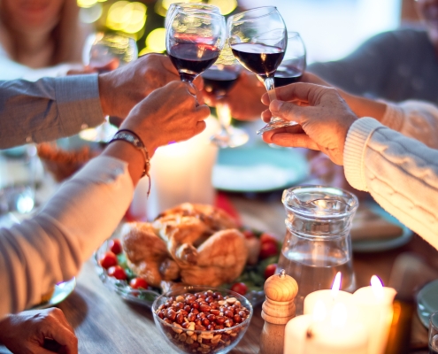 People connecting by sharing a traditional Christmas meal