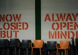 image of storefront with "no closed but" "always open minded" written on it; Soft Skills Matter: Flexibility