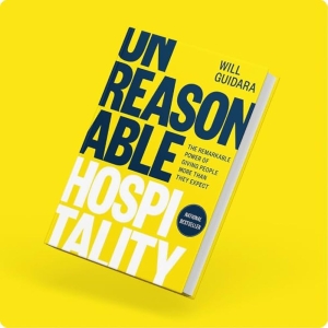 book cover for Unreasonable Hospitality by Will Guidara on a yellow background