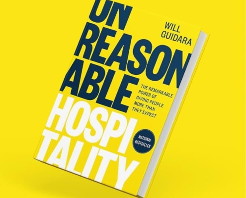 book cover for Unreasonable Hospitality by Will Guidara on a yellow background