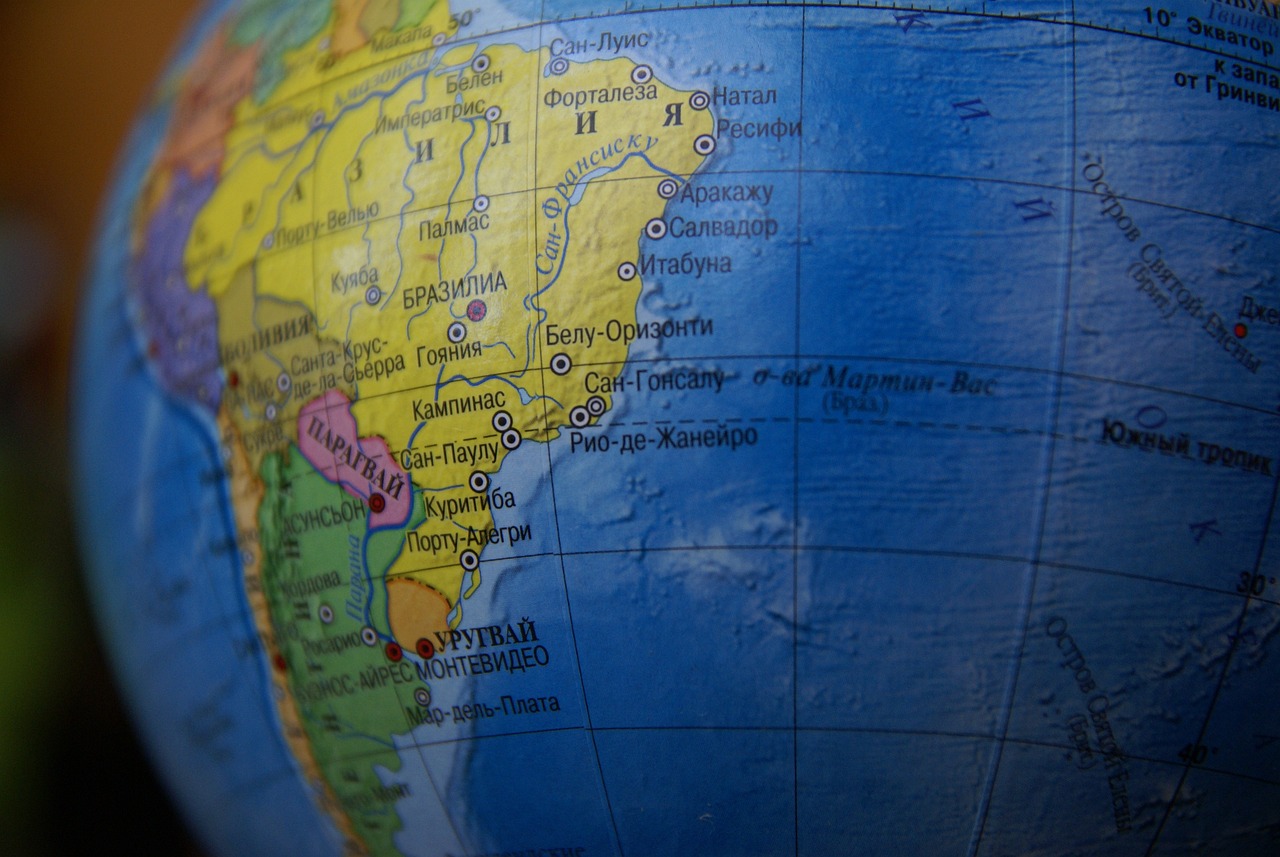 image of globe with focus on South America; Expert Market Commentary and OPIS Conference