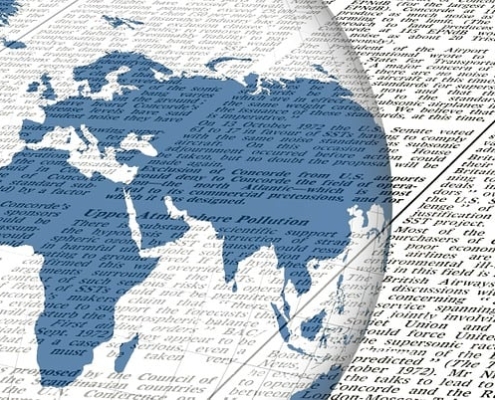 image of transparent globe with newspaper; Ukraine natural gas Russia