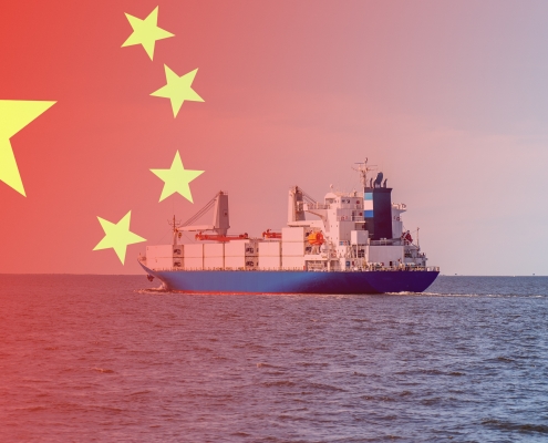 container ship on the ocean with overlay of China's flag ; US target China's ships